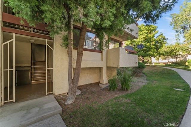 view of side of property featuring a balcony