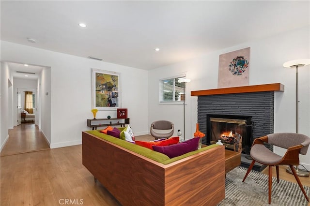 living room with light hardwood / wood-style floors