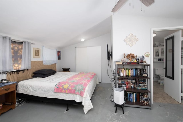 bedroom with concrete flooring, ceiling fan, and lofted ceiling