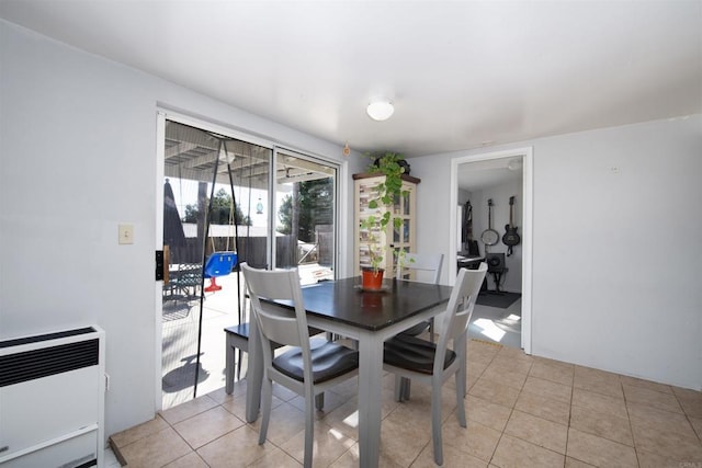 tiled dining room with heating unit