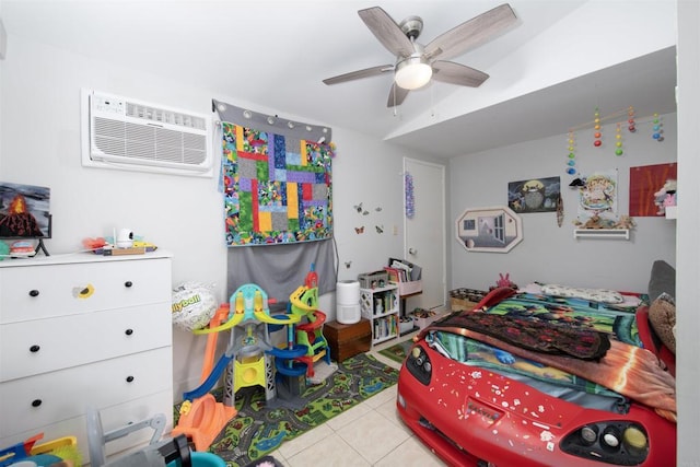 tiled bedroom featuring ceiling fan and a wall mounted air conditioner