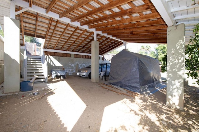 view of parking featuring a carport