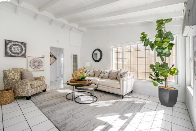 living room with vaulted ceiling with beams and light tile patterned floors