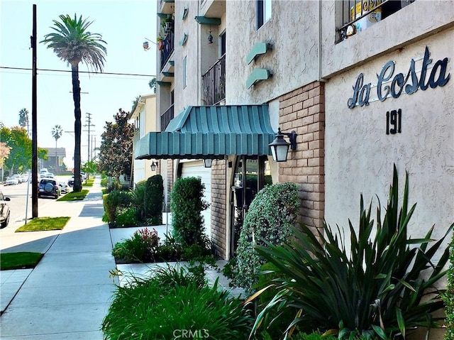 exterior space featuring stucco siding