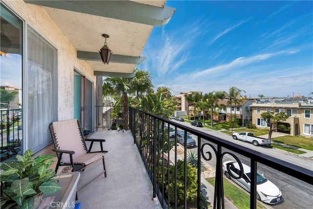 balcony featuring a residential view