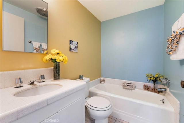 191 Kennebec Ave Unit 301, Long Beach, CA 90803 - bathroom featuring a garden tub, toilet, vanity, and tile patterned flooring