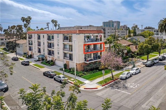 191 Kennebec Ave Unit 301, Long Beach, CA 90803 - view of apartment building / complex featuring uncovered parking