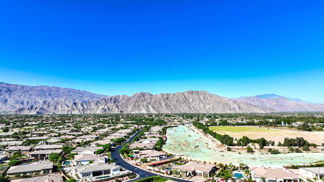 drone / aerial view featuring a mountain view