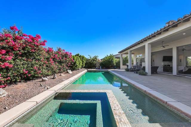 view of swimming pool featuring a patio area