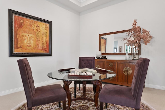 dining space with carpet floors