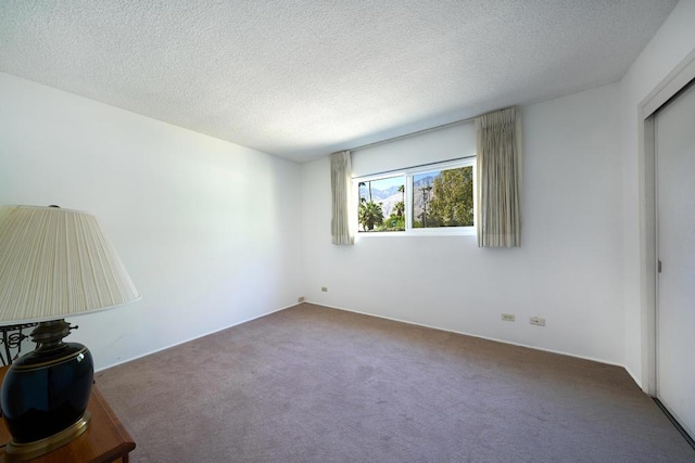 interior space with a textured ceiling