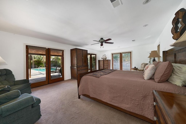 bedroom with access to outside, ceiling fan, french doors, and light colored carpet