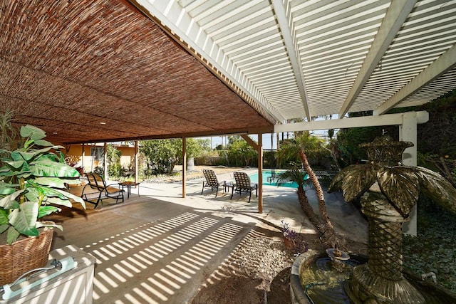 view of patio featuring a pergola