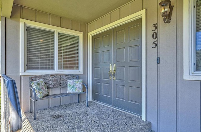 doorway to property with a porch