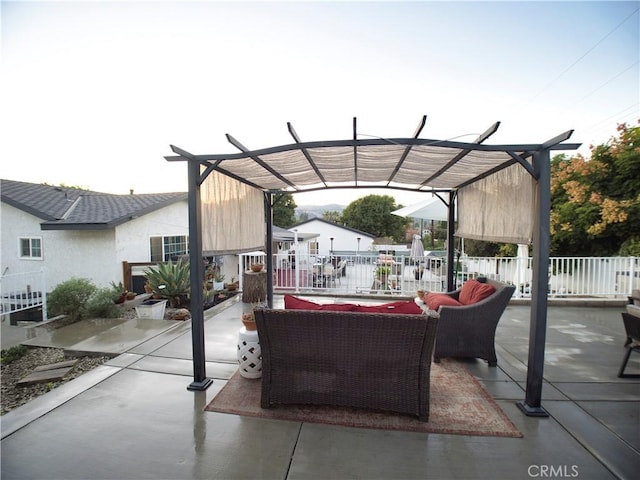 view of patio / terrace with fence, an outdoor hangout area, and a pergola