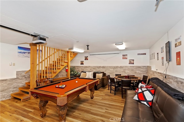 game room with hardwood / wood-style flooring and billiards