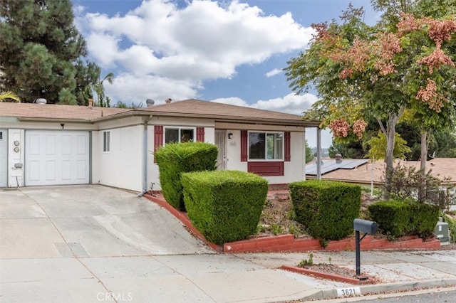 single story home with a garage