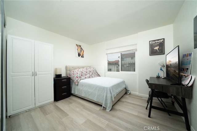 bedroom featuring light hardwood / wood-style floors