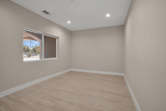 empty room featuring light hardwood / wood-style floors