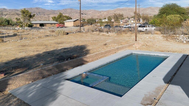 view of pool featuring a mountain view