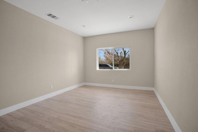 empty room with light wood-type flooring