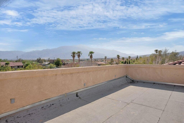 view of patio / terrace with a mountain view