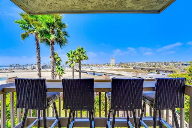 balcony featuring a water view