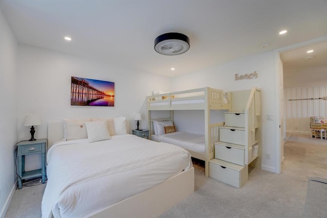 bedroom with light colored carpet