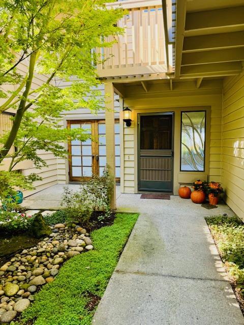 property entrance with a balcony