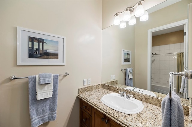 bathroom featuring vanity and shower / tub combo