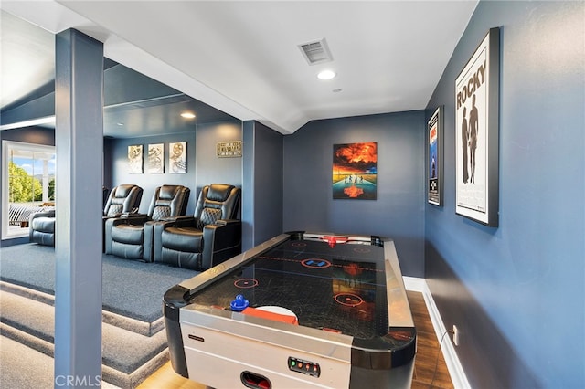 rec room featuring lofted ceiling and hardwood / wood-style floors