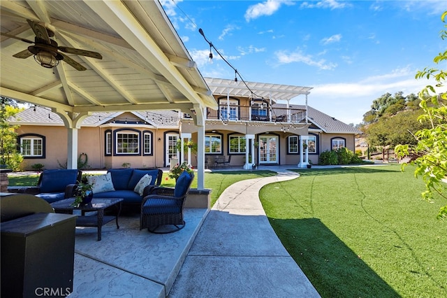 view of patio featuring an outdoor living space, ceiling fan, and a balcony