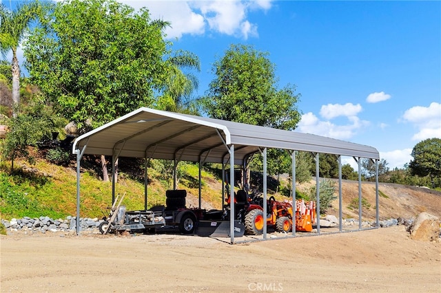 view of parking with a carport