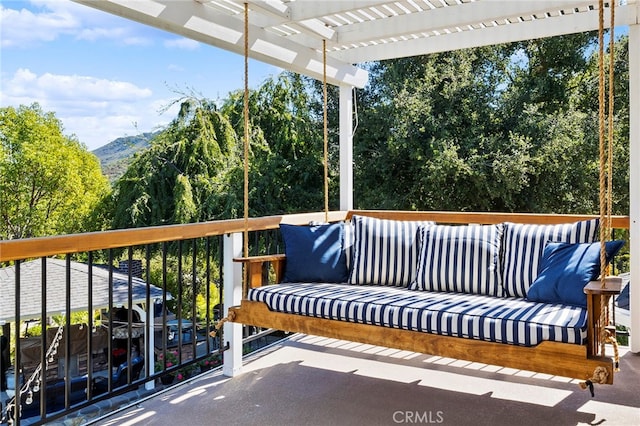 wooden deck featuring outdoor lounge area and a pergola