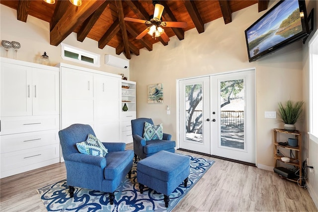 living area with beam ceiling, high vaulted ceiling, wooden ceiling, light hardwood / wood-style flooring, and french doors