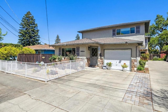 view of front of property featuring a garage