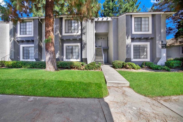 view of property with a front yard