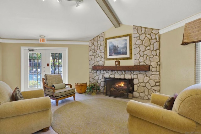 living room featuring vaulted ceiling with beams, ornamental molding, french doors, and a stone fireplace