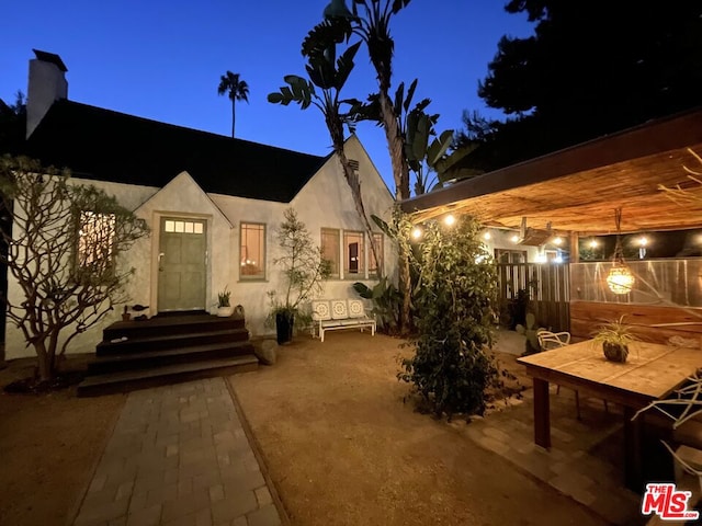 rear view of property with a patio area