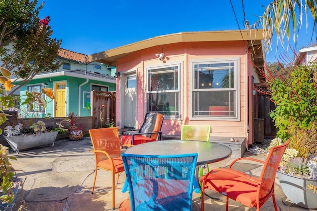 rear view of house featuring a patio