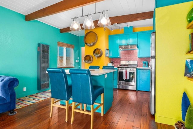 kitchen with hanging light fixtures, stainless steel range with gas cooktop, beam ceiling, a breakfast bar, and dark hardwood / wood-style floors