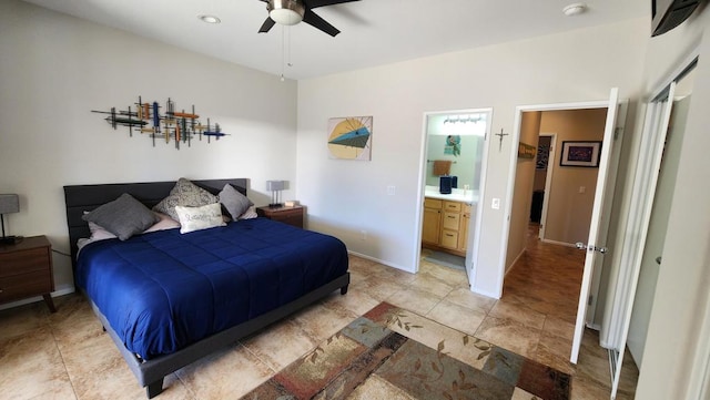 bedroom with connected bathroom and ceiling fan