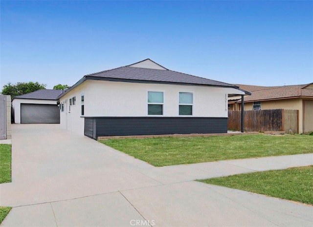 view of home's exterior featuring a yard and a garage