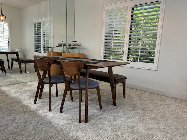 dining area with carpet