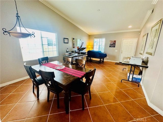 tiled dining space with ornamental molding and vaulted ceiling