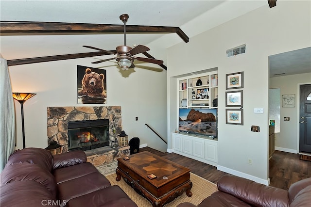 living room featuring vaulted ceiling with beams, dark hardwood / wood-style floors, and ceiling fan