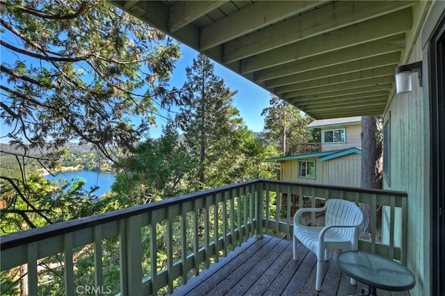 balcony featuring a water view