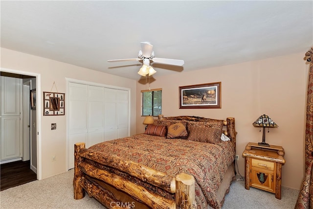 bedroom featuring a closet, ceiling fan, and carpet