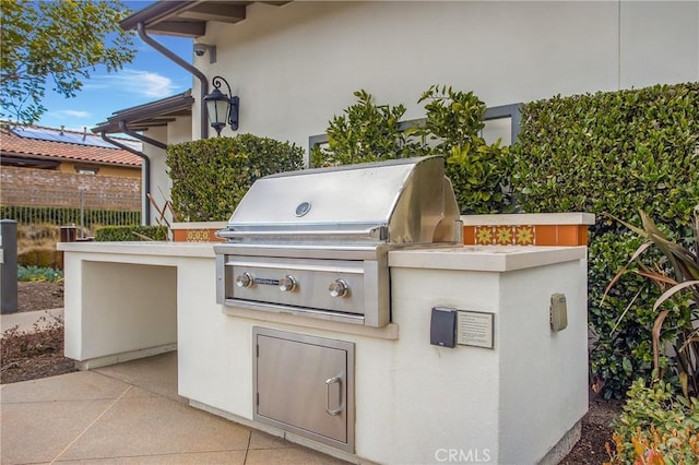 view of patio featuring a grill and area for grilling