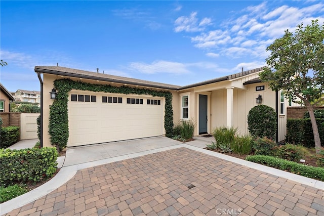 single story home featuring a garage